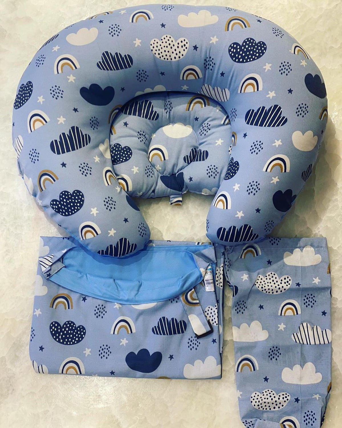 A set consisting of a breastfeeding cover + a rainbow design breastfeeding pillow